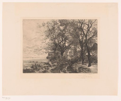 Snow landscape with a barn at the edge of the woods