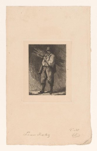 Man carrying a bundle of branches over his shoulder