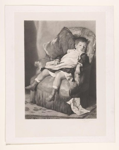Boy seated on a chair