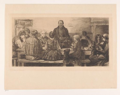 Family at table praying before the meal