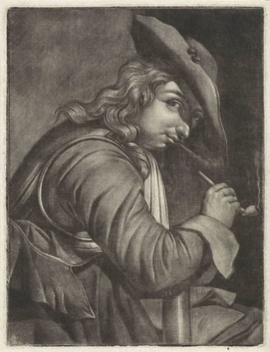 Young man smoking a pipe with a hat