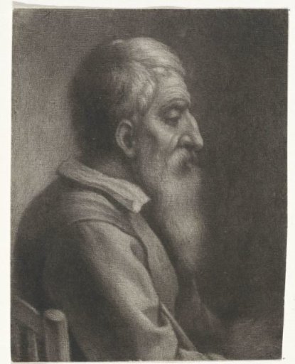 Bearded old man in a chair