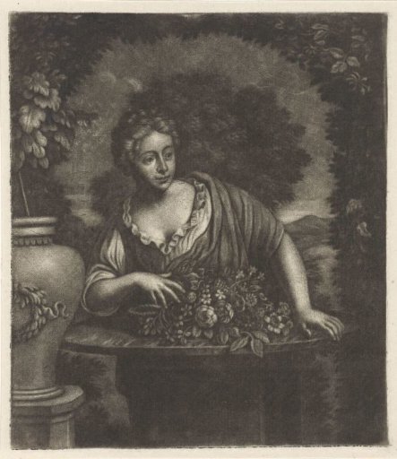Woman in a Garden Behind a Table with Flowers