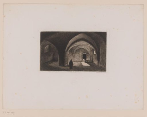 Monk in a dark room with a vaulted ceiling