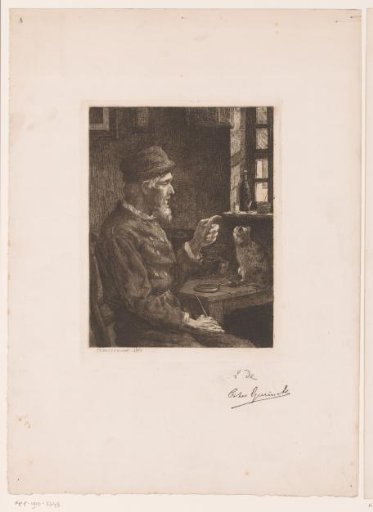 Seated man pointing at a cat on the table