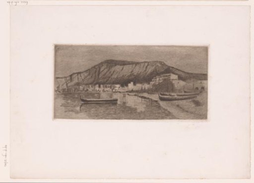 Coastal Village with a Steep Cliff Behind It