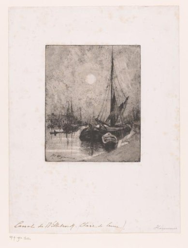 Sailing boats moored along a quay