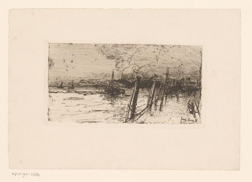 View of the water with boats and a quay