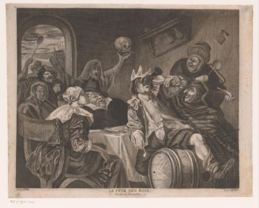 Festive company with a drinking man wearing a crown