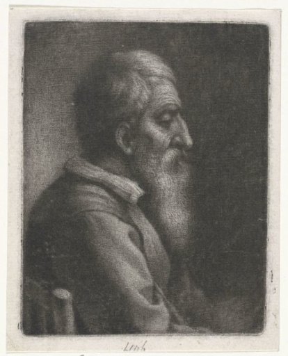 Bearded old man in a chair