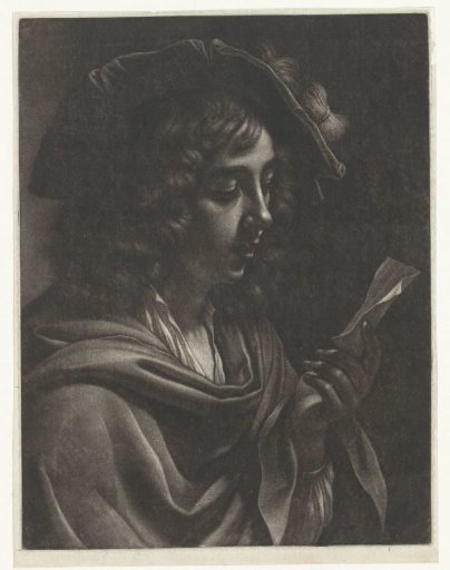 Boy reading a letter