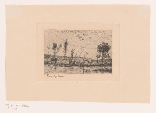 Fisherman in the Water at the Edge of a Lake