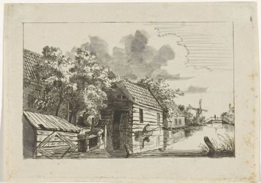 Small boat by a boathouse