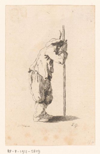 Standing man with staff turned to the right
