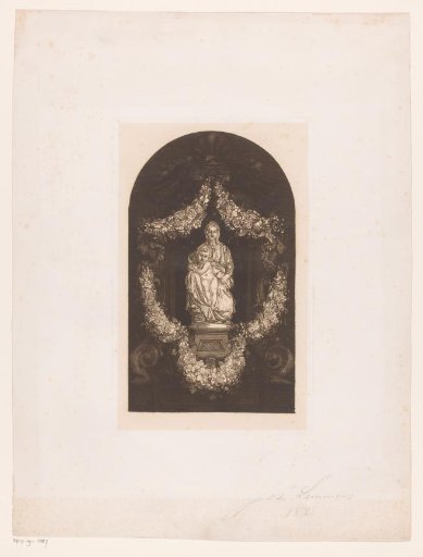 Beeld van Christus en Maria in een bloemenkrans