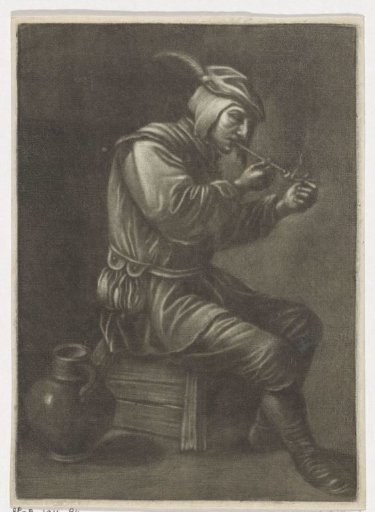 Man lighting his pipe