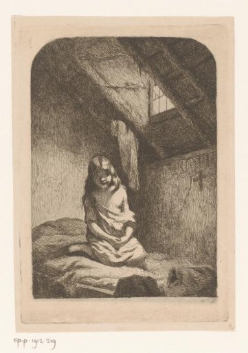 Girl on a bed in an attic room