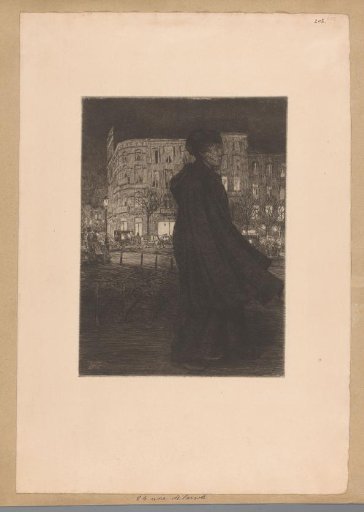 Woman walking in the evening along the street
