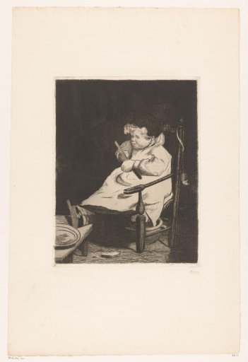 Child on a chair with an apple