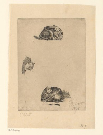 Two views of a wooden figure of a rat and a Japanese mask