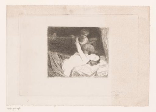 Young woman and child on a bed