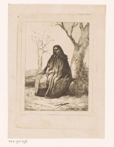 Woman seated on a log