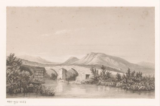 Hilly landscape with bridge over the water