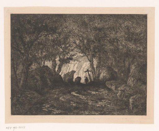 Man by a Wooden Cross at the Edge of a Forest