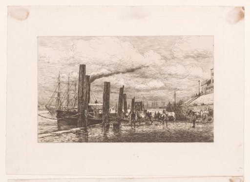 Paddle steamer moored at a quay