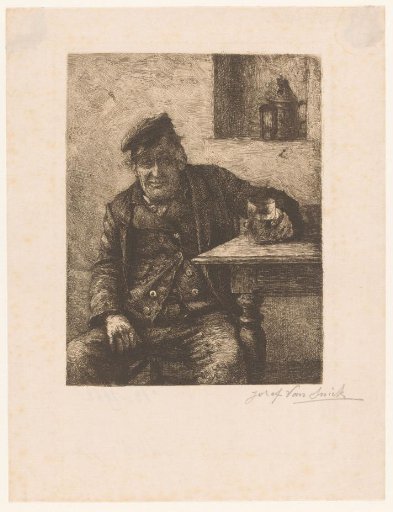 Man sitting at a table with drinking glass in hand