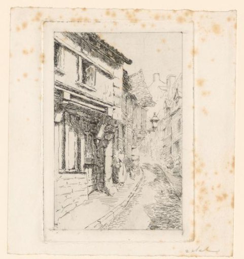 Street in a mountain village with a hanging lantern