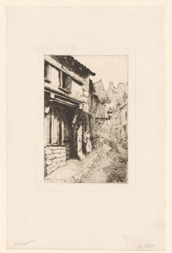 Street in a mountain village with a hanging lantern
