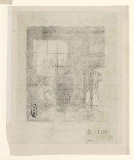 Man seated in a chair by a window