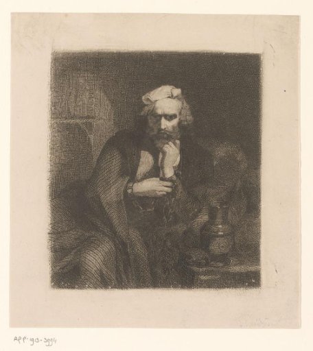 Man with chains around his hands