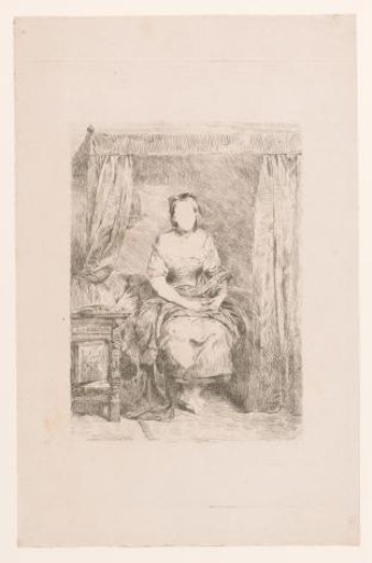 Young woman seated on a bed