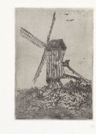 Wooden windmill in a landscape