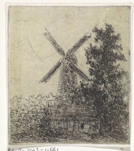Windmill behind a hut