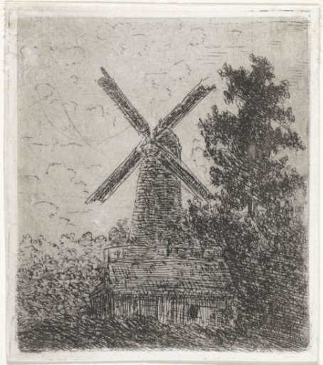 Windmill behind a hut