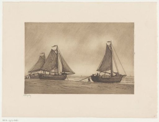 View of the beach of Katwijk with three fishing boats on the coastline