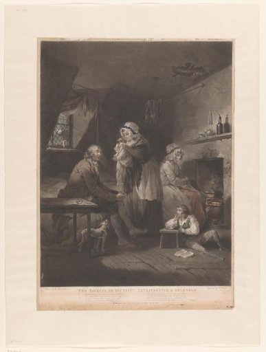 Poor family by a cooking fire