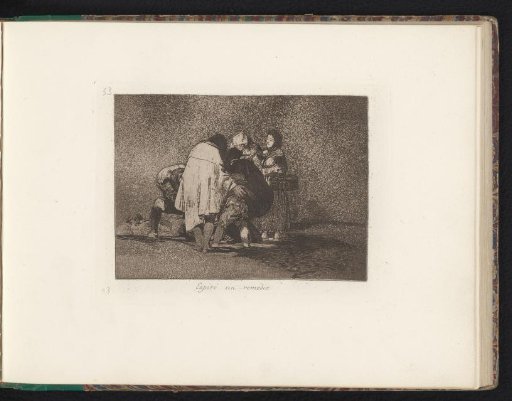 Group of mourning persons around a body