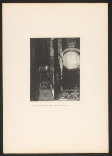 Dark interior with a large pillar