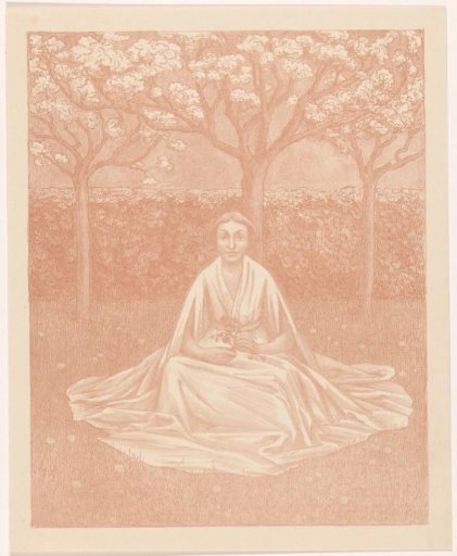 Woman in a dress sitting in a grassy field