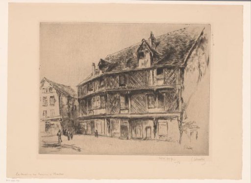 Street with houses and pedestrians in Chartres