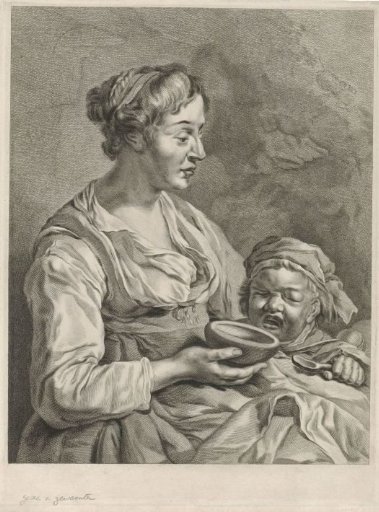 Mother feeding her child