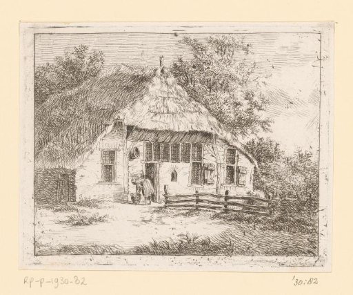 Woman bending over a basket in front of a house at Staphorst
