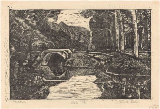 Bridge over a canal in a wood