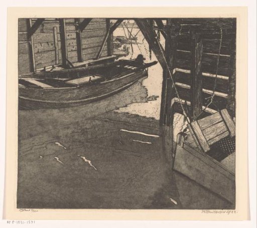 Interior of a boat house with a fish trap and a boat with a built-in fish trap