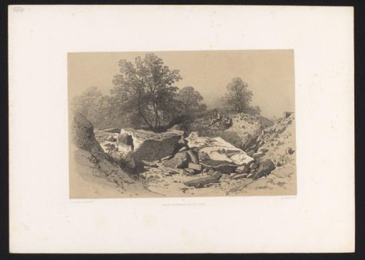 Boulders with a sketcher and a woman