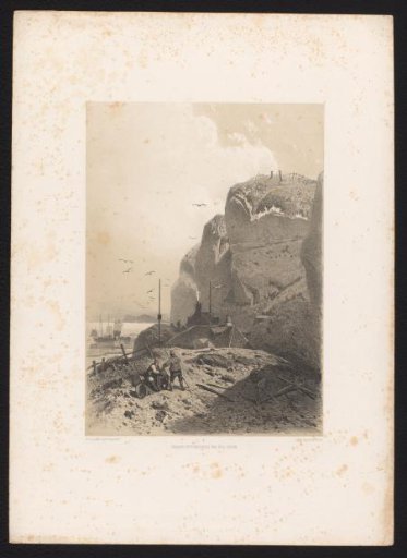 Coastal landscape with cliffs and fishing village